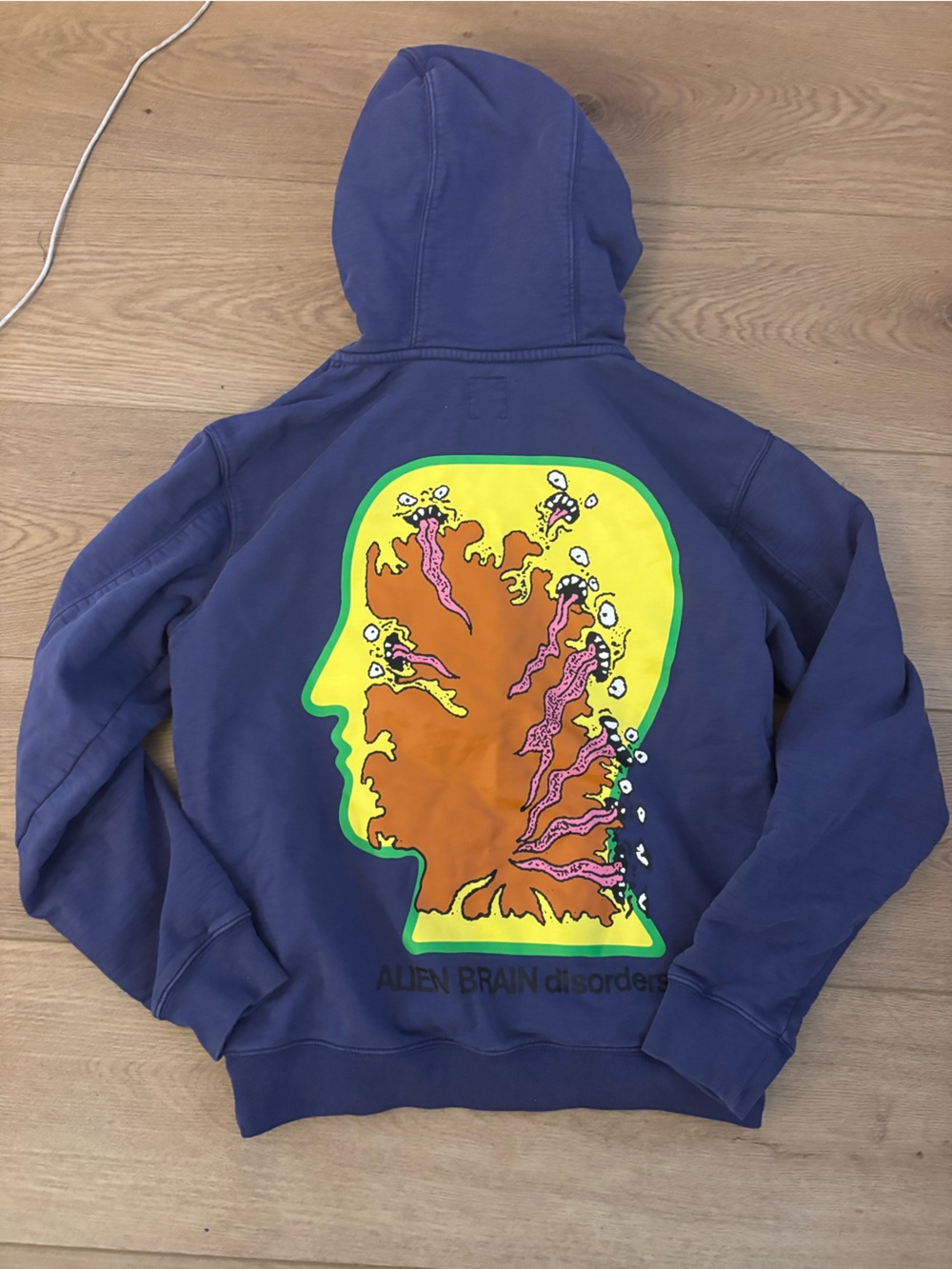 Brain Dead Navy Hoodie with Bright Multicolor Head Graphic
